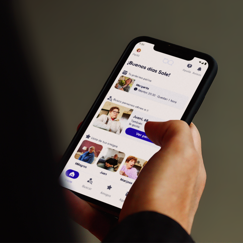 A hand holding a phone with the Palike app open