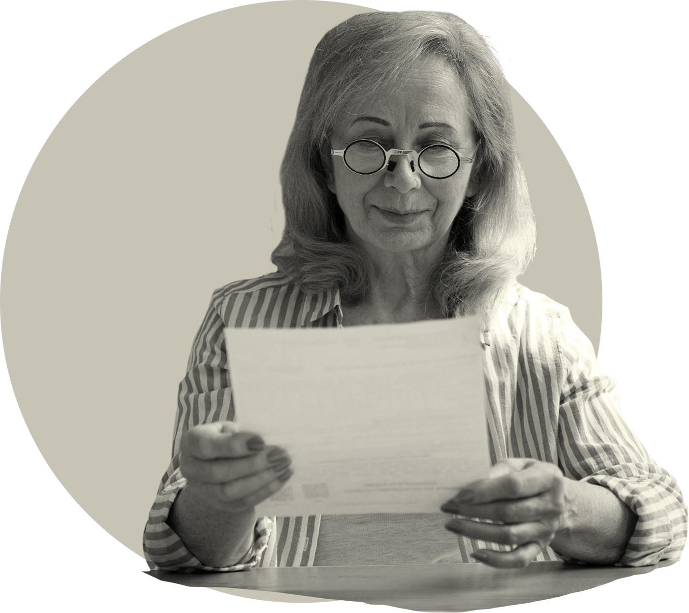An older woman reading a survey